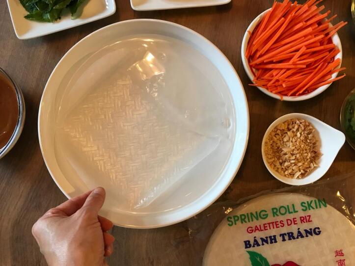 Rice paper sheets soaking in water.