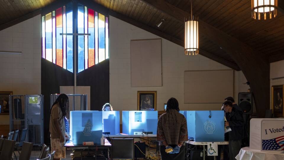 Voters mark their ballots for the mid-term election Tuesday, Nov. 8, 2022 at Lawrenceville Road United Methodist Church in Tucker, Ga.